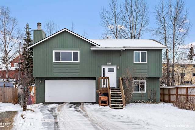 bi-level home featuring a garage