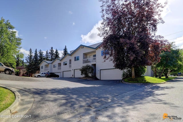 exterior space with a garage and driveway