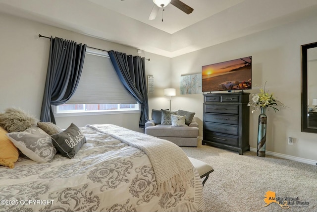 bedroom featuring carpet and baseboards