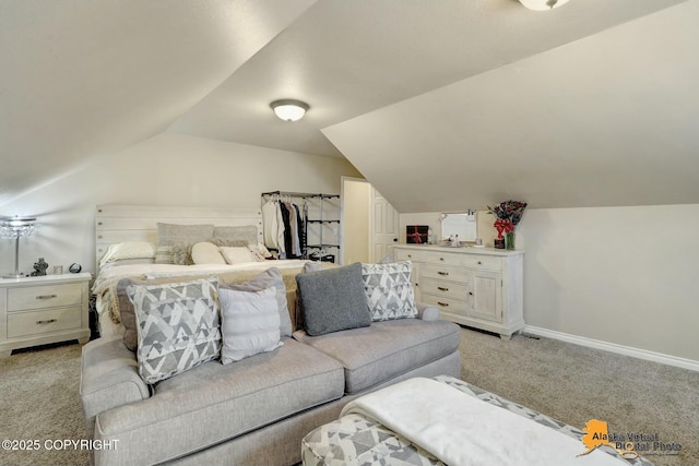 bedroom with lofted ceiling, baseboards, and light colored carpet