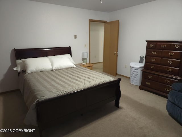 bedroom with light carpet