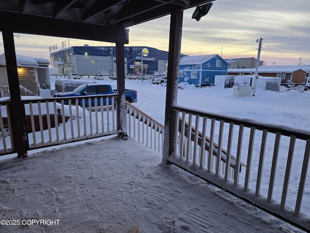 view of snow covered deck