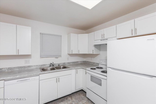 kitchen featuring white appliances, white cabinets, light countertops, under cabinet range hood, and a sink