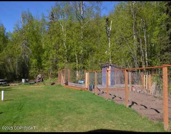 view of yard featuring a garden