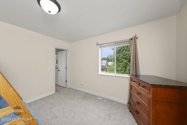 1968 S Paddock Dr, Wasilla, AK 99654 - bedroom featuring baseboards and light carpet