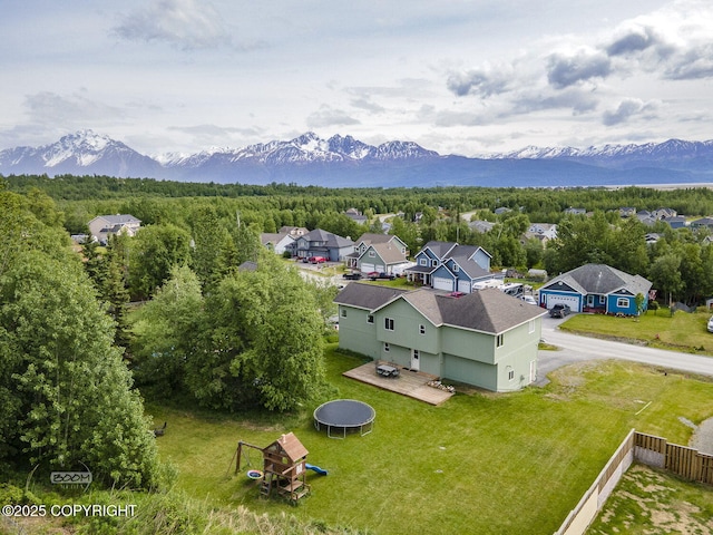 1968 S Paddock Dr, Wasilla, AK 99654 - aerial perspective of suburban area featuring a mountain backdrop