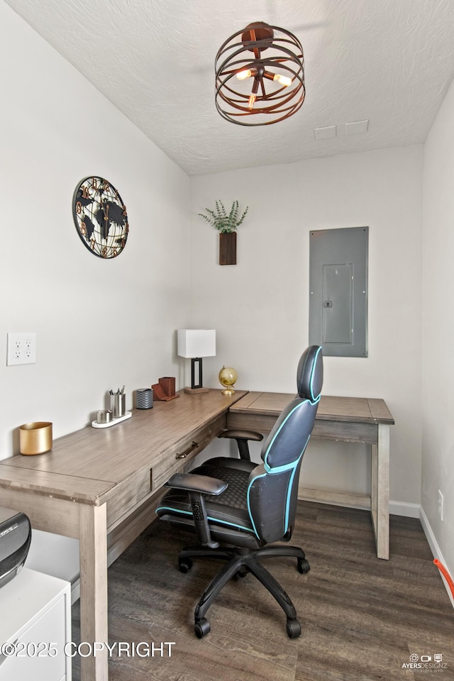 home office with electric panel, a textured ceiling, baseboards, and wood finished floors