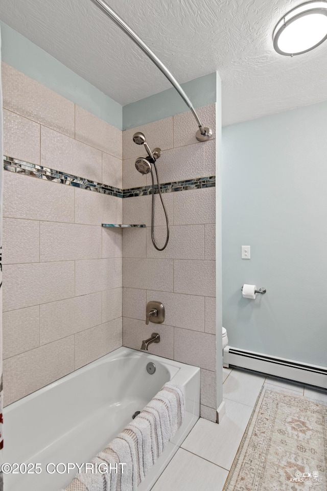 full bathroom with a textured ceiling, a baseboard radiator, toilet, and tub / shower combination