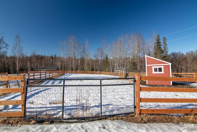 snow covered pool with fence