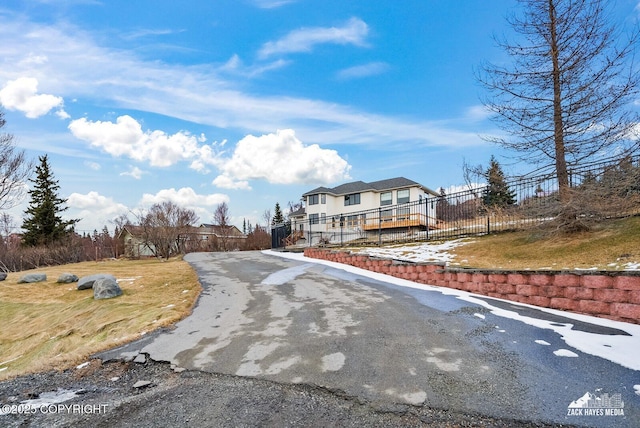 view of road with driveway