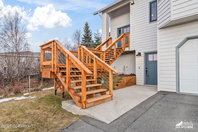 doorway to property featuring a garage