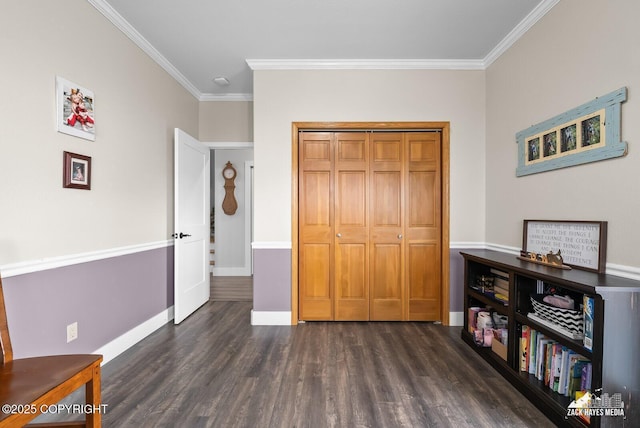 interior space with dark wood-type flooring, crown molding, and baseboards