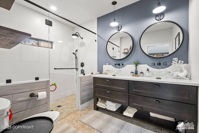 full bathroom with vanity and a walk in shower