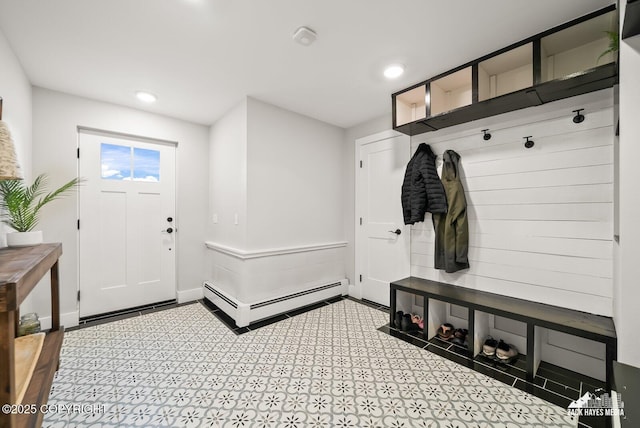 mudroom featuring recessed lighting, a baseboard heating unit, and baseboards