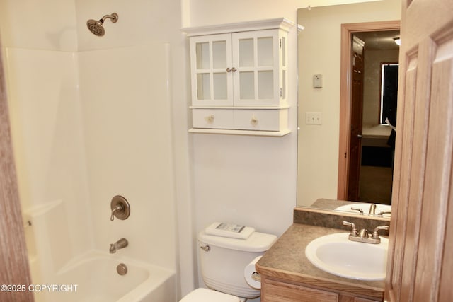 full bathroom featuring toilet, shower / tub combination, and vanity