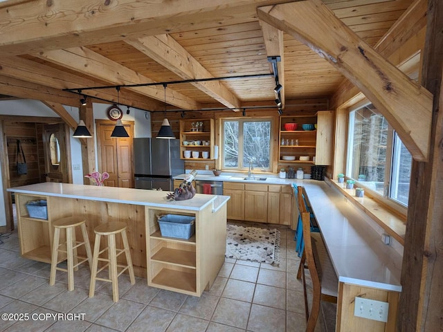 41650 Charlie Dr, Homer, AK 99603 - kitchen with open shelves, stainless steel appliances, a wood ceiling with exposed beams, light countertops, and light brown cabinets