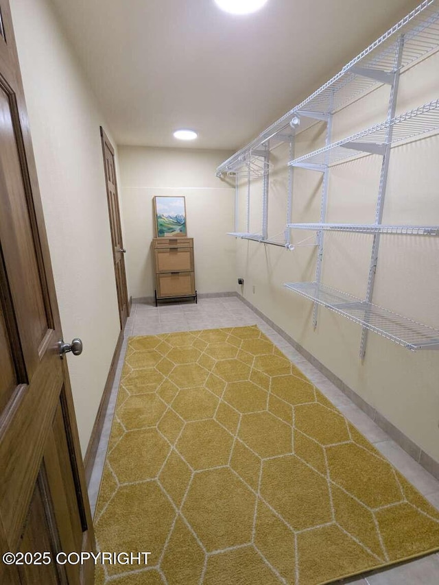 41650 Charlie Dr, Homer, AK 99603 - spacious closet with light tile patterned floors