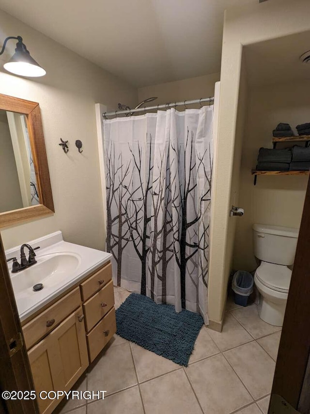 41650 Charlie Dr, Homer, AK 99603 - full bathroom with vanity, tile patterned flooring, and a shower with curtain