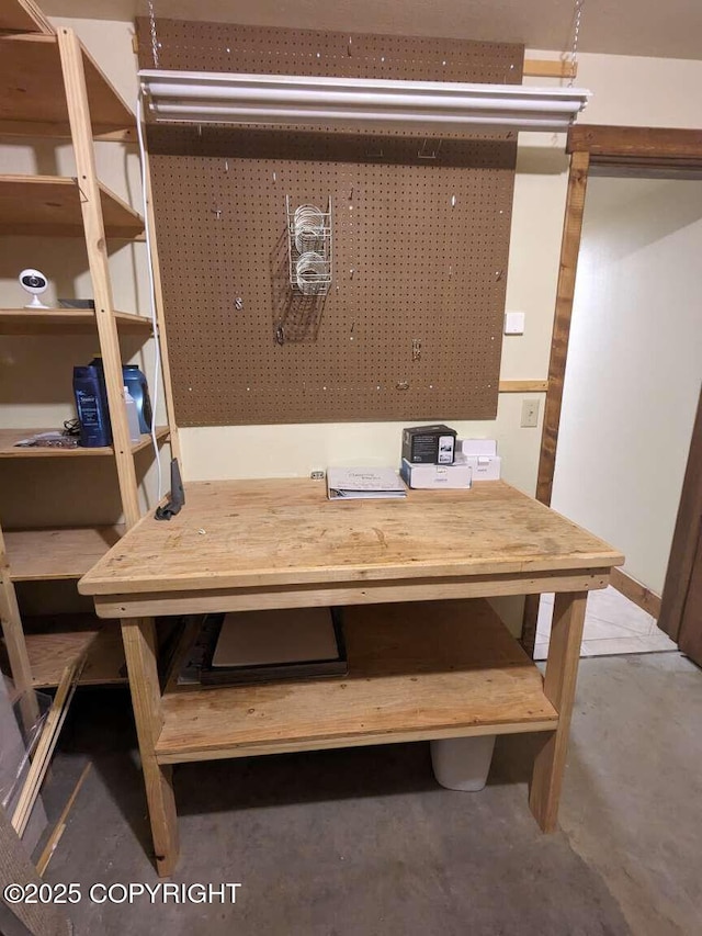 41650 Charlie Dr, Homer, AK 99603 - dining area featuring a workshop area and concrete flooring