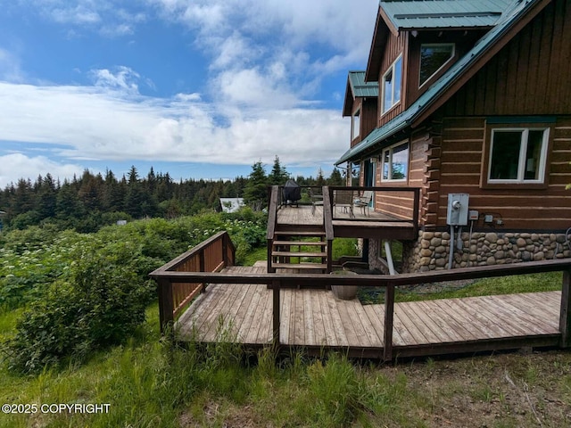 41650 Charlie Dr, Homer, AK 99603 - wooden terrace with a view of trees