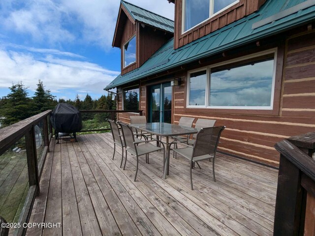 41650 Charlie Dr, Homer, AK 99603 - deck with outdoor dining space and area for grilling