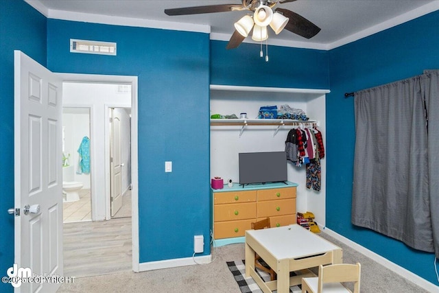 bedroom featuring carpet flooring, visible vents, ceiling fan, and baseboards