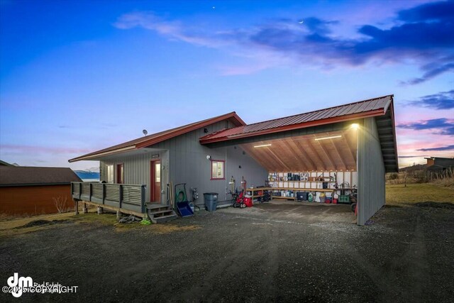 exterior space with metal roof