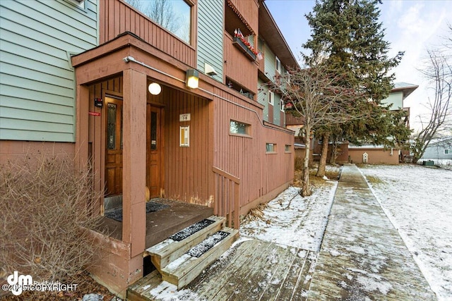 view of snow covered property