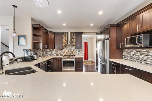 kitchen with dark brown cabinetry, wall chimney exhaust hood, stainless steel appliances, open shelves, and a sink