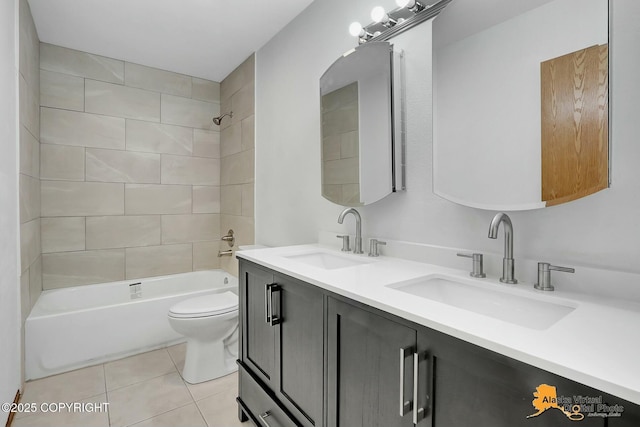 full bath with shower / washtub combination, tile patterned flooring, a sink, and double vanity