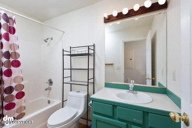 full bathroom with toilet, shower / bath combo with shower curtain, and vanity