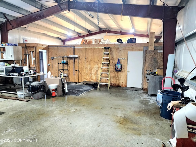 garage with a workshop area