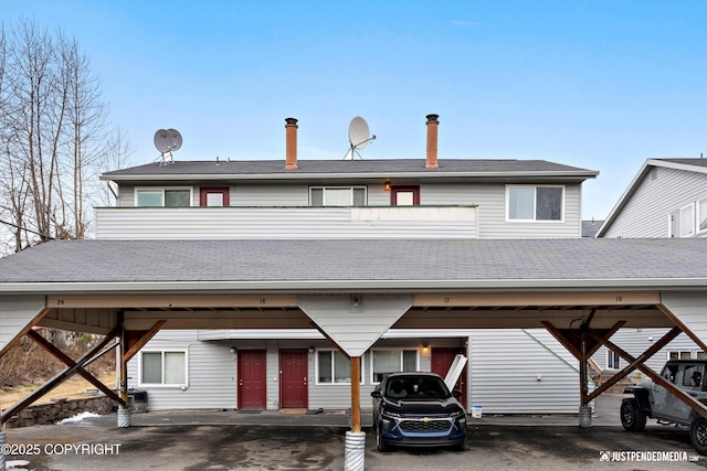 view of front of house featuring a shingled roof