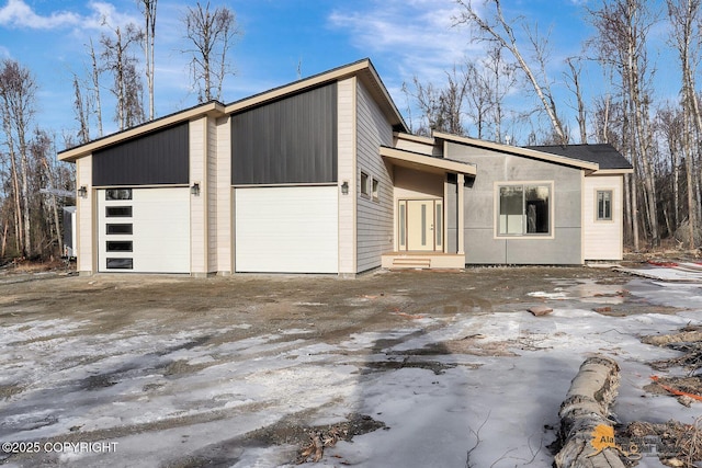 exterior space with a garage