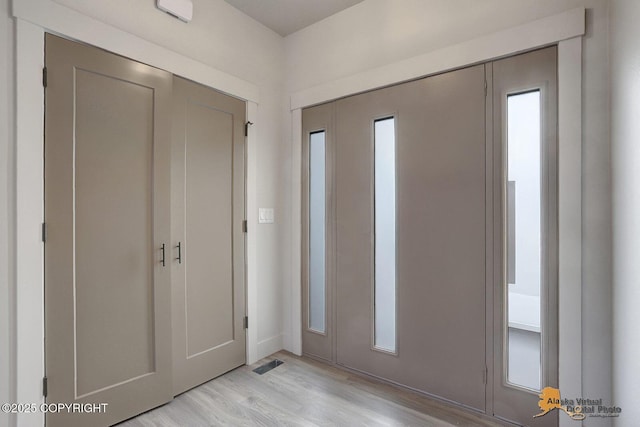 entrance foyer with light wood-style flooring