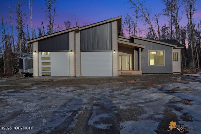 view of front of house with driveway and an attached garage