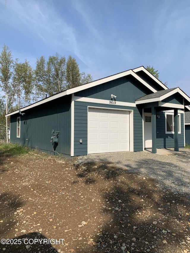 view of front of property with driveway and an attached garage