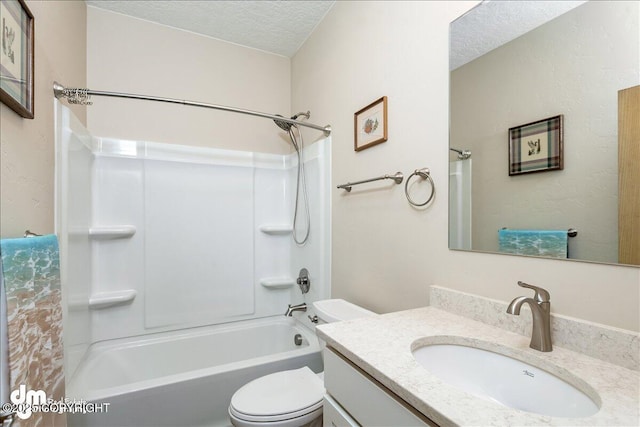 full bath with toilet, shower / tub combination, a textured ceiling, and vanity