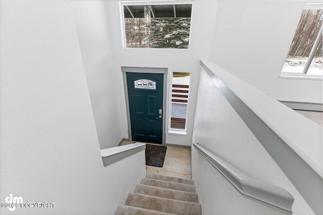 entrance to property featuring a baseboard radiator