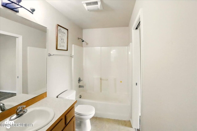 bathroom featuring toilet, vanity, shower / bathtub combination, and tile patterned floors