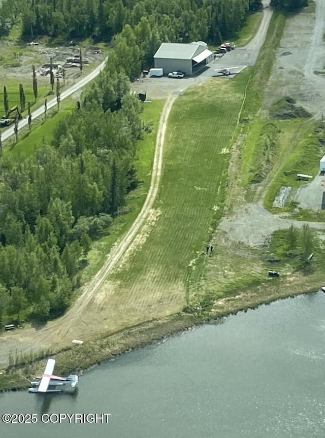 3151 E Cottle Loop, Wasilla, AK 99654 - aerial view of property's location featuring rural landscape and a nearby body of water