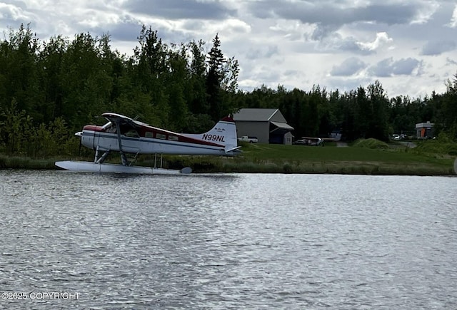 3151 E Cottle Loop, Wasilla, AK 99654 - water view featuring a heavily wooded area