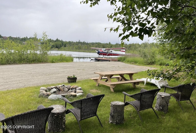 3151 E Cottle Loop, Wasilla, AK 99654 - view of green lawn with a water view and a view of trees