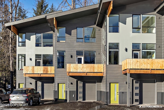 view of building exterior with an attached garage