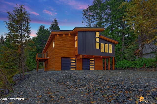 modern home with driveway and an attached garage