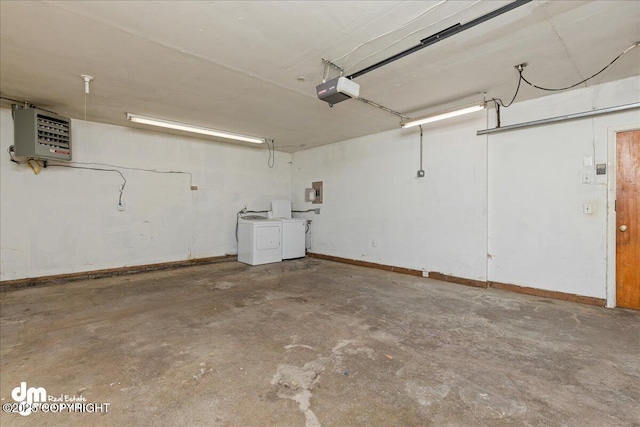 541 E 22nd Ave, Anchorage, AK 99503 - garage featuring independent washer and dryer, baseboards, a garage door opener, and electric panel