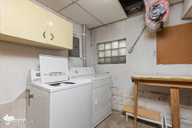 541 E 22nd Ave, Anchorage, AK 99503 - laundry area featuring cabinet space, washer and clothes dryer, concrete block wall, and electric panel