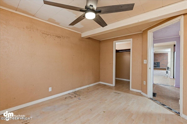 541 E 22nd Ave, Anchorage, AK 99503 - unfurnished bedroom featuring wood finished floors, baseboards, ceiling fan, and a closet