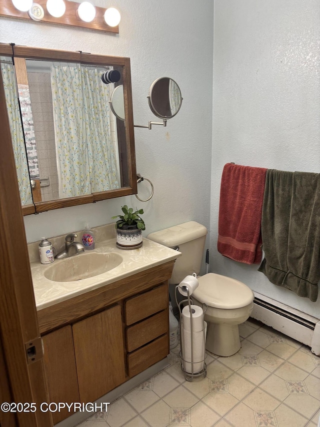 full bathroom featuring a baseboard heating unit, a textured wall, vanity, a shower with curtain, and toilet