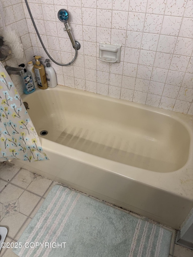 full bath with a bath, tile patterned floors, and curtained shower